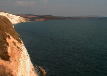 View from the Freshwater Down road looking East along the SouthEastern coast of the island.